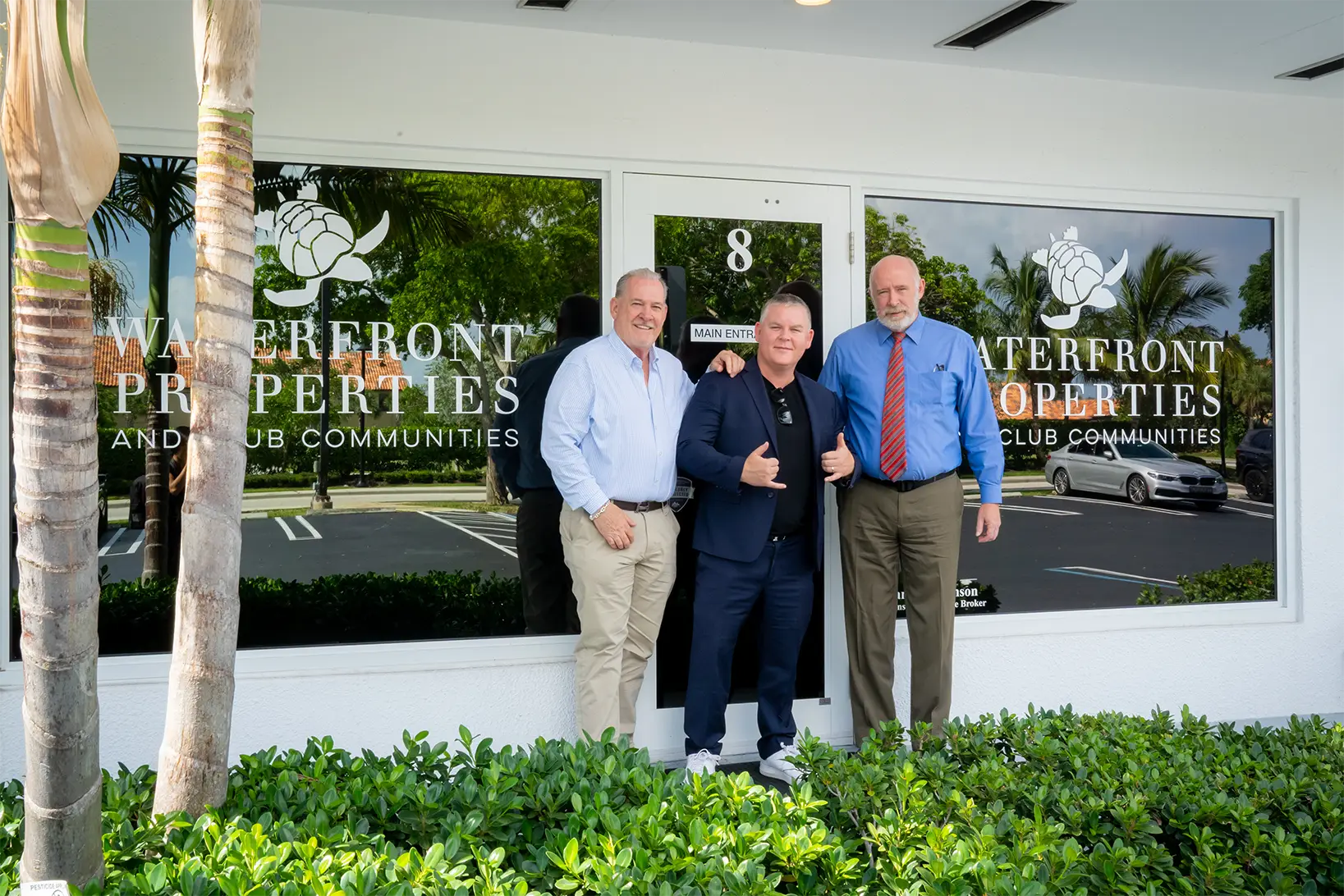 Image of Rob Thomson (left) and David Abernathy (right) of Waterfront Properties and Club Communities and Morgan Carey, CEO of Real Estate Webmasters (middle)