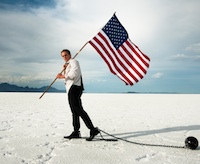 guy holding american flag 200px